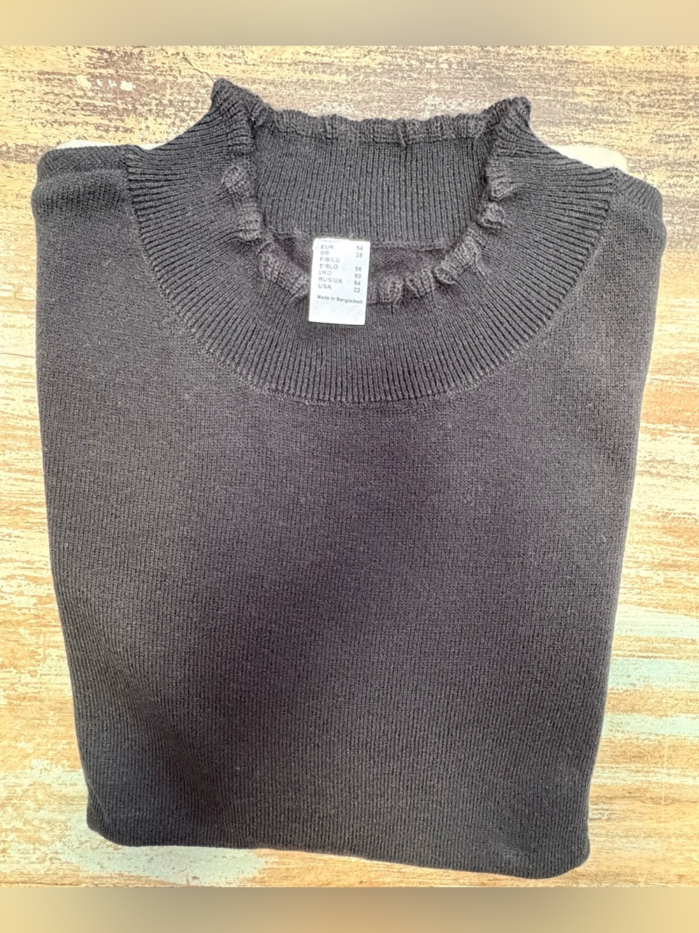 Black Ruffled Turtleneck Sweater